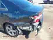 2014 Toyota Camry SE with VIN 4T1BF1FK3EU377777, listed as a IAAI auction lot 43397597 with 211,826 mi miles and . Bid and sale history available at DreamBid. Image 6.