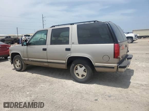 1999 Chevrolet Tahoe с VIN 1GNEC13R2XJ573460, выставлен на аукционе Copart как лот 56869395 с пробегом 175 836 миль миль и Чистый • Clean title. История ставок и продаж доступна на DreamBid. Изображение 2.