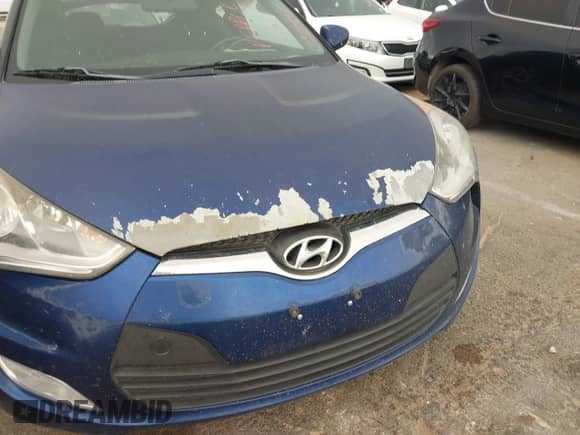 2017 Hyundai Veloster Value Edition z VIN KMHTC6AD9HU309362, wystawiony jako IAAI lot #43008981 z przebiegiem 157 915 mil mil oraz . Historia ofert i sprzedaży dostępna na DreamBid. Obrazek 6.