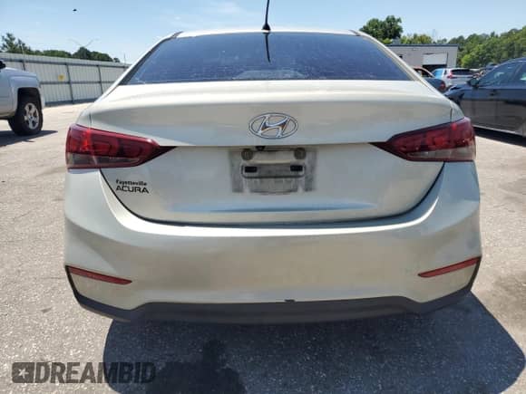2018 Hyundai Accent SE with VIN 3KPC24A38JE013675, listed as a Copart auction lot 61670155 with 144,397 mi miles and Salvage title. Bid and sale history available at DreamBid. Image 6.