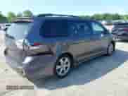 2012 Toyota Sienna SE with VIN 5TDXK3DCXCS267405, listed as a IAAI auction lot 42401101 with 134,553 mi miles and . Bid and sale history available at DreamBid. Image 4.