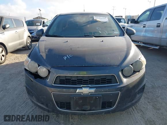 2013 Chevrolet Sonic LS z VIN 1G1JA5SH0D4210770, wystawiony jako IAAI lot #43362167 z przebiegiem 145 661 mil mil oraz . Historia ofert i sprzedaży dostępna na DreamBid. Obrazek 12.