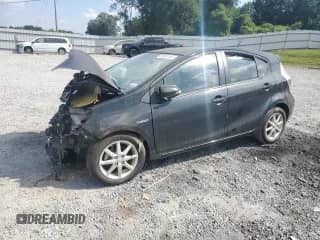 2012 Toyota Prius Four z VIN JTDKDTB34C1512557, wystawiony jako Copart lot #81591185 z przebiegiem Nie podano mil oraz Szkoda całkowita • Salvage title. Historia ofert i sprzedaży dostępna na DreamBid. Obrazek 1.