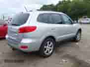 2009 Hyundai Santa Fe SE z VIN 5NMSH73E79H233808, wystawiony jako IAAI lot #43154188 z przebiegiem 119 381 mil mil oraz . Historia ofert i sprzedaży dostępna na DreamBid. Obrazek 4.