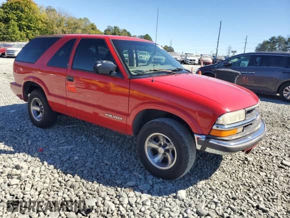 2000 Chevrolet Blazer LS с VIN 1GNCS18W9YK241469, выставлен на аукционе Copart как лот 75532144 с пробегом 216 870 миль миль и Списание • Salvage title. История ставок и продаж доступна на DreamBid. Изображение 4.