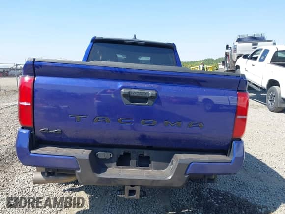 2024 Toyota Tacoma TRD Off Road with VIN 3TMLB5JN7RM001123, listed as a IAAI auction lot 43085472 with 35,813 mi miles and . Bid and sale history available at DreamBid. Image 16.