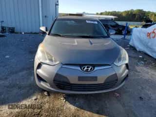 2012 Hyundai Veloster w/Black Int z VIN KMHTC6AD0CU023084, wystawiony jako Copart lot #82597005 z przebiegiem 187 990 mil mil oraz Czysty tytuł • Clean title. Historia ofert i sprzedaży dostępna na DreamBid. Obrazek 5.