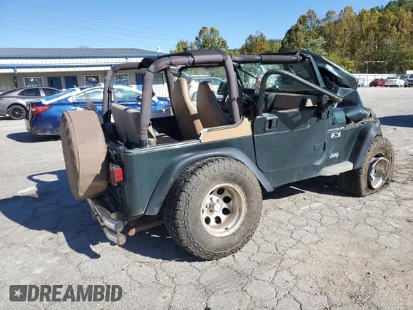 2002 Jeep Wrangler X z VIN 1J4FA39S12P776350, wystawiony jako Copart lot #82276415 z przebiegiem 196 023 mil mil oraz Szkoda całkowita • Salvage title. Historia ofert i sprzedaży dostępna na DreamBid. Obrazek 3.
