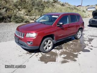 2014 Jeep Compass Sport with VIN 1C4NJDBB8ED567758, listed as a Copart auction lot 67984065 with 123,788 mi miles and Salvage title. Bid and sale history available at DreamBid. Image 1.