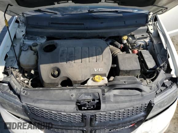 2018 Dodge Journey Crossroad with VIN 3C4PDDGGXJT504217, listed as a Copart auction lot 75477844 with 121,011 mi miles and Salvage title. Bid and sale history available at DreamBid. Image 14.
