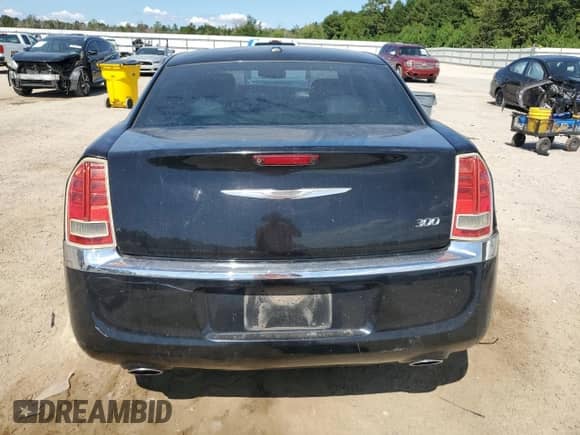 2012 Chrysler 300 Limited с VIN 2C3CCACG4CH279945, выставлен на аукционе Copart как лот 71684855 с пробегом 241 391 миль миль и Списание • Salvage title. История ставок и продаж доступна на DreamBid. Изображение 6.