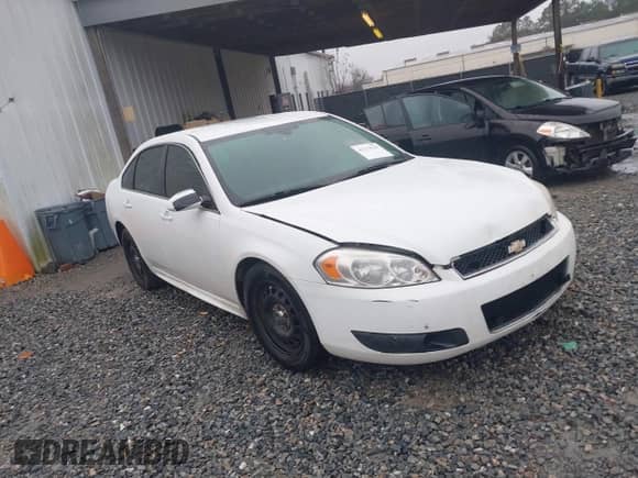 2013 Chevrolet Impala Police z VIN 2G1WD5E33D1210058, wystawiony jako IAAI lot #41574143 z przebiegiem 156 643 mil mil oraz . Historia ofert i sprzedaży dostępna na DreamBid. Obrazek 1.