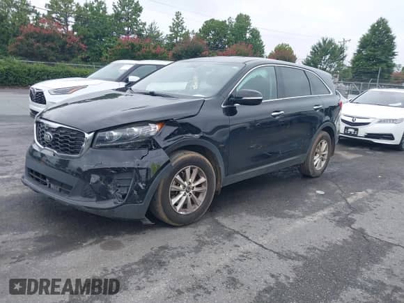 2019 Kia Sorento LX with VIN 5XYPG4A30KG578400, listed as a IAAI auction lot 42983250 with 151,959 mi miles and . Bid and sale history available at DreamBid. Image 17.