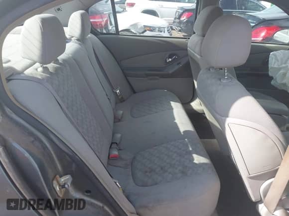 2005 Chevrolet Malibu LS z VIN 1G1ZT54845F225904, wystawiony jako IAAI lot #42660197 z przebiegiem 204 988 mil mil oraz . Historia ofert i sprzedaży dostępna na DreamBid. Obrazek 8.