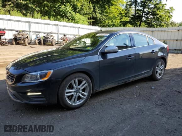 2014 Volvo S60 T6 with VIN YV1902FHXE1293885, listed as a Copart auction lot 61904664 with 105,151 mi miles and Salvage title. Bid and sale history available at DreamBid. Image 1.