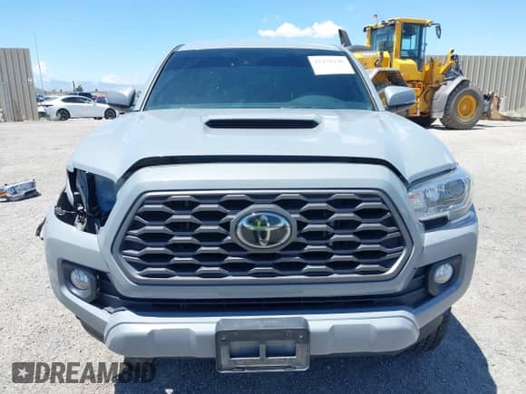 2020 Toyota Tacoma SR5 z VIN 3TMBZ5DN9LM027314, wystawiony jako IAAI lot #42258246 z przebiegiem 81 254 mil mil oraz . Historia ofert i sprzedaży dostępna na DreamBid. Obrazek 13.