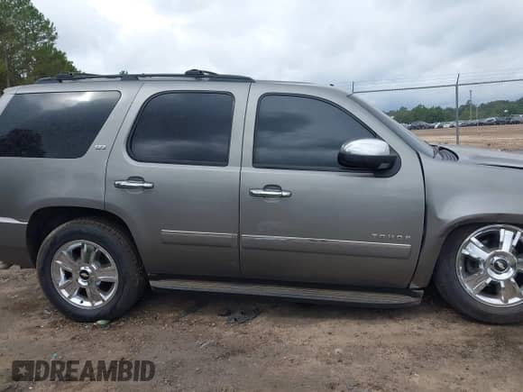 2012 Chevrolet Tahoe LTZ with VIN 1GNSCCE00CR189878, listed as a IAAI auction lot 43297739 with 129,423 mi miles and . Bid and sale history available at DreamBid. Image 14.