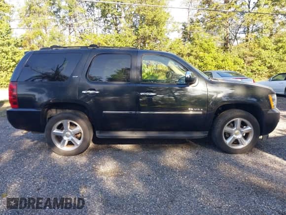 2010 Chevrolet Tahoe LTZ with VIN 1GNUKCE0XAR174233, listed as a IAAI auction lot 43380569 with 149,369 mi miles and . Bid and sale history available at DreamBid. Image 14.