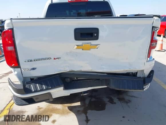 2019 Chevrolet Colorado 2WD Z71 z VIN 1GCGSDEN9K1270894, wystawiony jako IAAI lot #41744431 z przebiegiem 72 574 mil mil oraz . Historia ofert i sprzedaży dostępna na DreamBid. Obrazek 6.