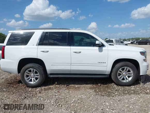 2015 Chevrolet Tahoe LT with VIN 1GNSCBKC5FR711983, listed as a IAAI auction lot 42738741 with 120,486 mi miles and . Bid and sale history available at DreamBid. Image 14.