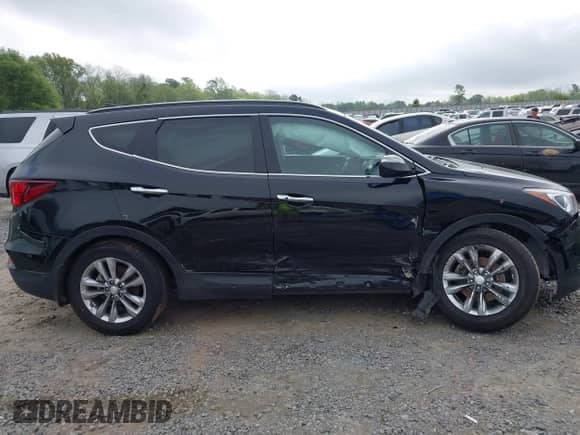 2018 Hyundai Santa Fe 2.0T with VIN 5NMZUDLA3JH057978, listed as a IAAI auction lot 41930580 with 118,100 mi miles and . Bid and sale history available at DreamBid. Image 13.