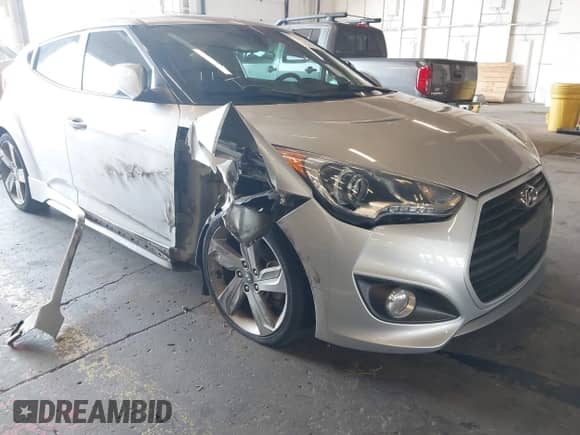 2013 Hyundai Veloster Turbo с VIN KMHTC6AEXDU145719, выставлен на аукционе IAAI как лот 43144474 с пробегом 51 191 миль миль и . История ставок и продаж доступна на DreamBid. Изображение 6.