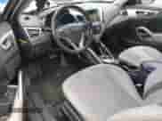 2012 Hyundai Veloster w/Gray Int z VIN KMHTC6AD8CU046631, wystawiony jako Copart lot #68106965 z przebiegiem 120 090 mil mil oraz Szkoda całkowita • Salvage title. Historia ofert i sprzedaży dostępna na DreamBid. Obrazek 8.