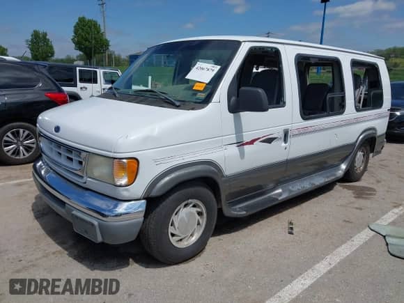 1999 Ford Econoline Cargo Recreational with VIN 1FDRE14L2XHA41059, listed as a IAAI auction lot 42067879 with 149,185 mi miles and . Bid and sale history available at DreamBid. Image 2.