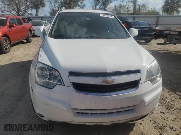 2014 Chevrolet Captiva Sport LTZ с VIN 3GNAL4EK2ES554953, выставлен на аукционе Copart как лот 77829244 с пробегом Не указан миль и Списание • Salvage title. История ставок и продаж доступна на DreamBid. Изображение 5.