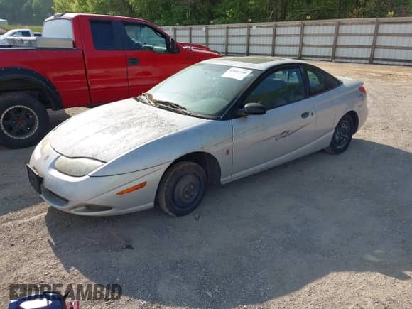 2001 Saturn SC with VIN 1G8ZN12891Z234288, listed as a IAAI auction lot 42041546 with Not provided miles and . Bid and sale history available at DreamBid. Image 2.