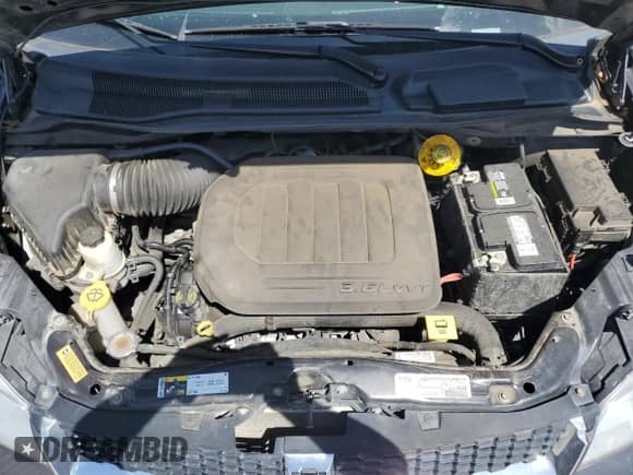 2020 Dodge Grand Caravan SXT with VIN 2C4RDGCG0LR161567, listed as a Copart auction lot 67039855 with 103,284 mi miles and Salvage title. Bid and sale history available at DreamBid. Image 12.