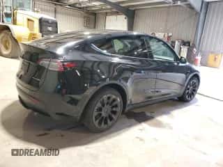 2023 Tesla Model Y Long Range with VIN 7SAYGAEE5PF921301, listed as a Copart auction lot 67586274 with 3,969 mi miles and Salvage title. Bid and sale history available at DreamBid. Image 3.