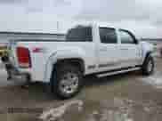 2010 GMC Sierra 1500 SLT z VIN 3GTRKWE29AG160857, wystawiony jako Copart lot #86632774 z przebiegiem 135 414 mil mil oraz Szkoda całkowita • Salvage title. Historia ofert i sprzedaży dostępna na DreamBid. Obrazek 3.