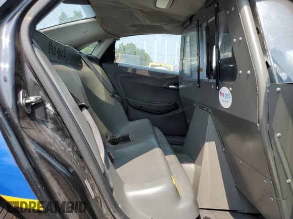 2014 Chevrolet Caprice Police Police с VIN 6G3NS5U31EL934940, выставлен на аукционе Copart как лот 67400984 с пробегом 99 842 миль миль и На запчасти • Non repairable. История ставок и продаж доступна на DreamBid. Изображение 10.