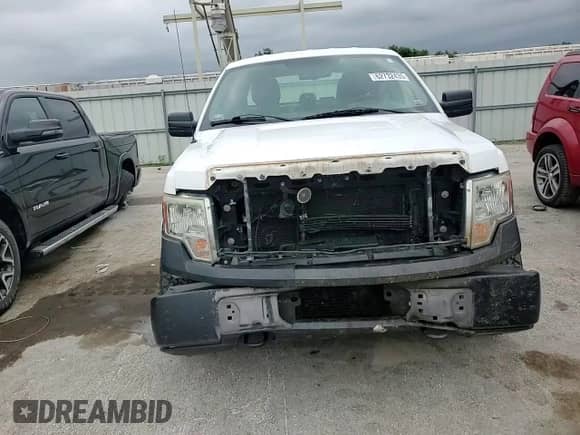 2013 Ford F-150 XL with VIN 1FTFX1ET8DKE77039, listed as a Copart auction lot 62732435 with 131,401 mi miles and Salvage title. Bid and sale history available at DreamBid. Image 13.