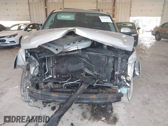 2009 Chevrolet Suburban 2LT z VIN 1GNFK26369R240705, wystawiony jako IAAI lot #43364816 z przebiegiem Nie podano mil oraz . Historia ofert i sprzedaży dostępna na DreamBid. Obrazek 11.