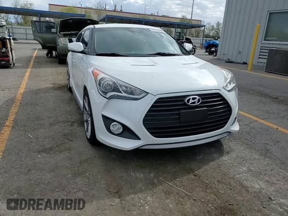 2014 Hyundai Veloster Turbo R-Spec с VIN KMHTC6AE1EU208532, выставлен на аукционе Copart как лот 70159995 с пробегом 75 844 миль миль и Списание • Salvage title. История ставок и продаж доступна на DreamBid. Изображение 13.