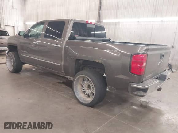 2014 Chevrolet Silverado 1500 LTZ with VIN 3GCUKSEC9EG225675, listed as a IAAI auction lot 42165845 with 139,417 mi miles and . Bid and sale history available at DreamBid. Image 3.