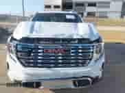 2023 GMC Sierra 1500 Denali z VIN 3GTUUGED4PG345211, wystawiony jako IAAI lot #42995625 z przebiegiem 63 396 mil mil oraz . Historia ofert i sprzedaży dostępna na DreamBid. Obrazek 12.