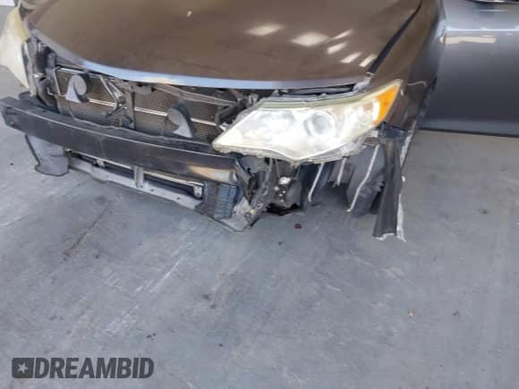 2013 Toyota Camry LE z VIN 4T1BD1FK7DU064283, wystawiony jako IAAI lot #42308435 z przebiegiem 183 355 mil mil oraz . Historia ofert i sprzedaży dostępna na DreamBid. Obrazek 6.