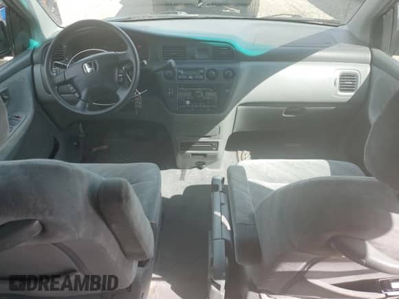 2004 Honda Odyssey EX-RES с VIN 5FNRL18834B127296, выставлен на аукционе Copart как лот 70983665 с пробегом 99 715 миль миль и Списание • Salvage title. История ставок и продаж доступна на DreamBid. Изображение 8.