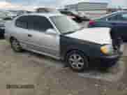 2004 Hyundai Accent GL z VIN KMHCG35C64U279929, wystawiony jako Copart lot #81661824 z przebiegiem 99 222 mil mil oraz Szkoda całkowita • Salvage title. Historia ofert i sprzedaży dostępna na DreamBid. Obrazek 4.