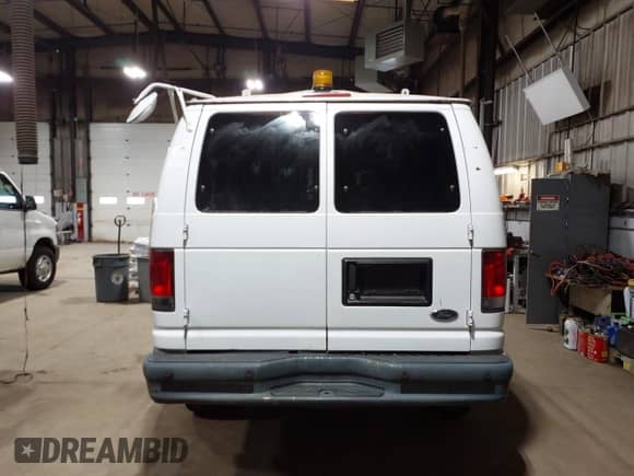 2014 Ford Econoline Cargo Commercial with VIN 1FTNE2EL6EDB13764, listed as a IAAI auction lot 42647684 with 99,876 mi miles and . Bid and sale history available at DreamBid. Image 16.
