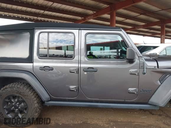 2021 Jeep Wrangler Unlimited Willys with VIN 1C4HJXDN3MW563173, listed as a IAAI auction lot 43073511 with 45,061 mi miles and . Bid and sale history available at DreamBid. Image 13.