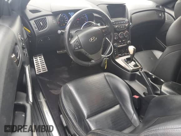 2013 Hyundai Genesis Coupe R-Spec с VIN KMHHU6KJ7DU102700, выставлен на аукционе Copart как лот 66547434 с пробегом 83 345 миль миль и Списание • Salvage title. История ставок и продаж доступна на DreamBid. Изображение 8.