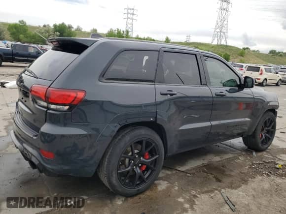 2018 Jeep Grand Cherokee SRT z VIN 1C4RJFDJ4JC144290, wystawiony jako Copart lot #59344945 z przebiegiem 61 809 mil mil oraz Szkoda całkowita • Salvage title. Historia ofert i sprzedaży dostępna na DreamBid. Obrazek 3.