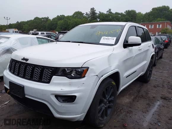 2020 Jeep Grand Cherokee Laredo E with VIN 1C4RJFAG9LC271385, listed as a IAAI auction lot 42468734 with 68,529 mi miles and . Bid and sale history available at DreamBid. Image 17.