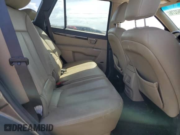 2012 Hyundai Santa Fe Limited z VIN 5XYZK4AG6CG153372, wystawiony jako Copart lot #61257275 z przebiegiem 157 016 mil mil oraz Szkoda całkowita • Salvage title. Historia ofert i sprzedaży dostępna na DreamBid. Obrazek 11.