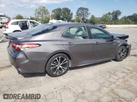 2019 Toyota Camry Hybrid SE с VIN 4T1B21HK2KU521372, выставлен на аукционе Copart как лот 85365895 с пробегом 79 115 миль миль и Списание • Salvage title. История ставок и продаж доступна на DreamBid. Изображение 3.