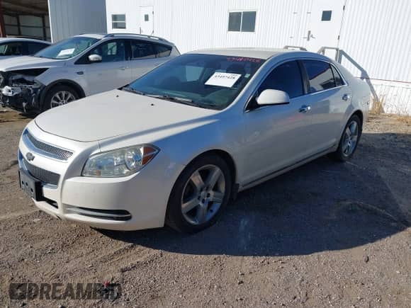 2012 Chevrolet Malibu 3LT z VIN 1G1ZF5E7XCF205473, wystawiony jako IAAI lot #43497428 z przebiegiem 119 915 mil mil oraz . Historia ofert i sprzedaży dostępna na DreamBid. Obrazek 2.